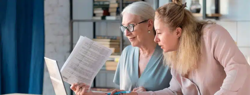 an adult child discussing financial matters with a parent